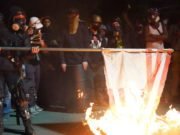 Black Lives Matter Protesters Burn Bibles, US Flag In Portland Bibles on Fire, courthouse in portland