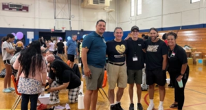Church Donates Over 1,000 Sneakers To Local Families At Back-To-School Giveaway Event Church Donates Sneakers To Families