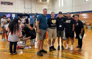 Church Donates Over 1,000 Sneakers To Local Families At Back-To-School Giveaway Event Church Donates Sneakers To Families