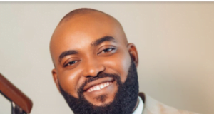 Gospel Artiste Neon Adejo Receives Silver Plaque From YouTube For Surpassing 100K Subscribers Neon Adejo Gets YouTube Plaque